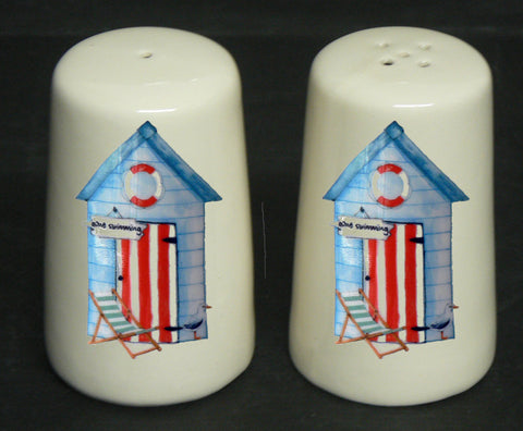 Beach Huts cruet set salt & pepper set. Cream earthenware cruet with blue beach huts to front deckchairs to back of each pot