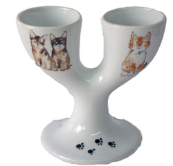 Cats design double egg cups. Porcelain eggcup designed for 2 boiled eggs