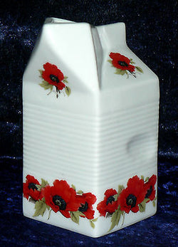Milk carton shaped jug off white ceramic decorated with  colourful poppies