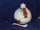 Poppy Salt pig & ceramic spoon  White porcelain decorated with colourful poppies